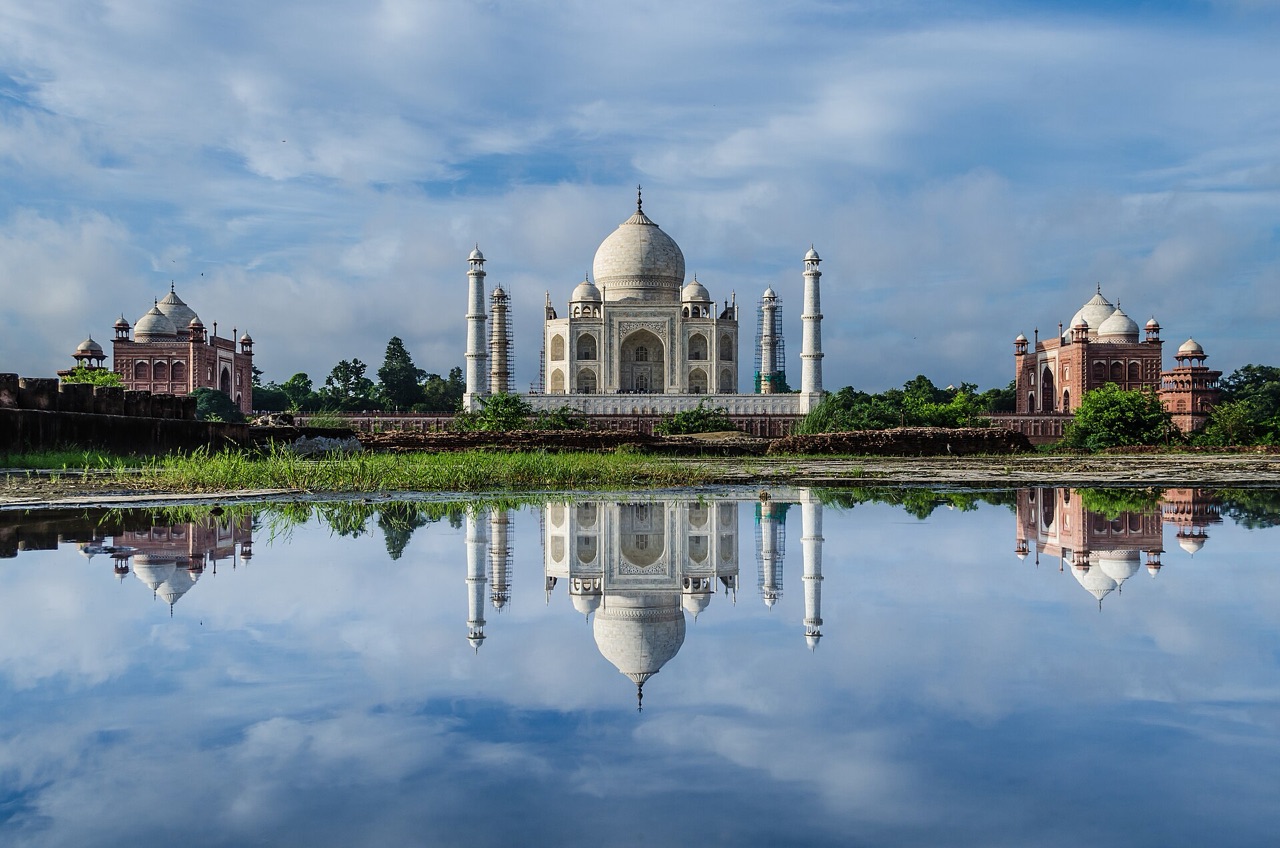 The Taj Mahal in Agra reflected in its long garden pool