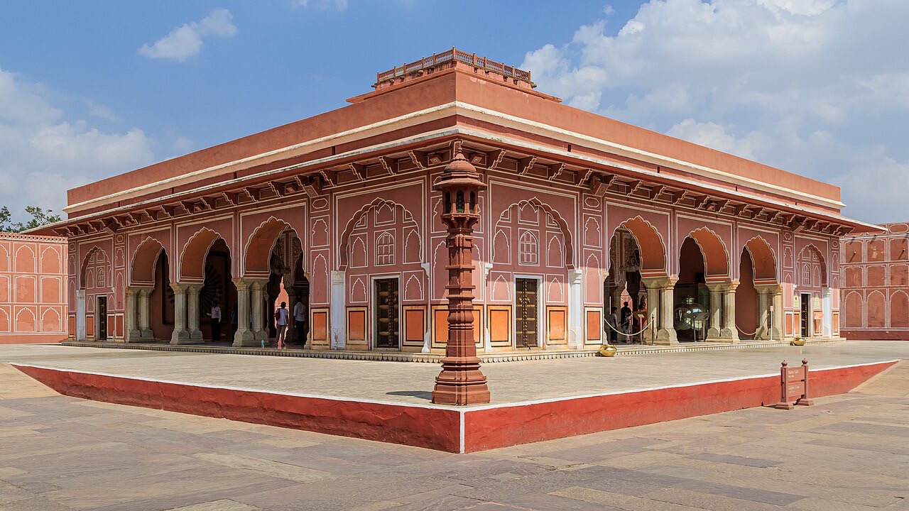 A pink arcaded hall inside the City Palace complex in Jaipur